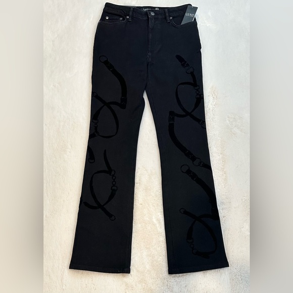 AUTHENTICATED
Belting-Print High-Rise Boot Jean
Lauren - Picture 11 of 15